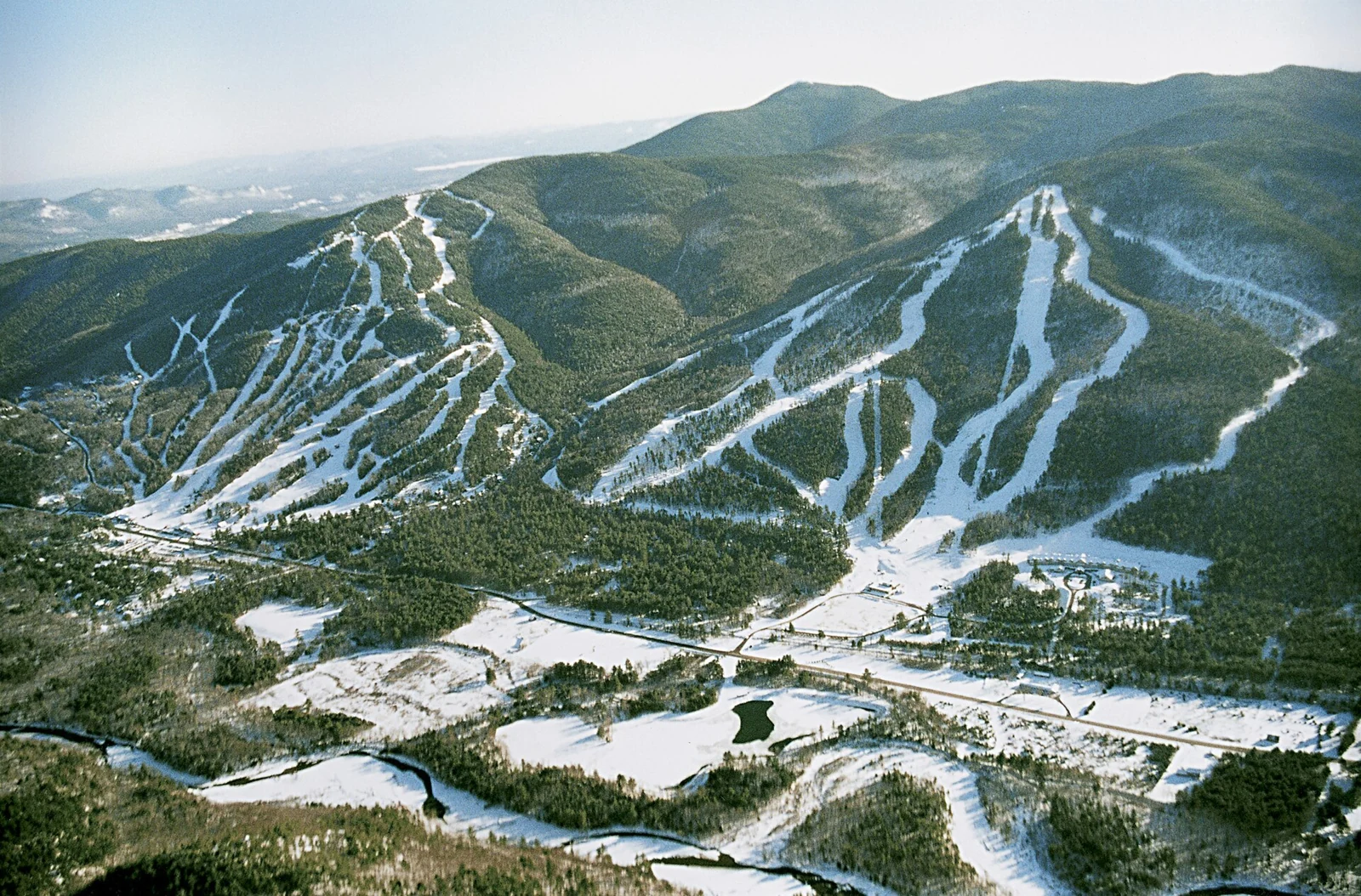 An aerial view of the snowy ski runs at Attitash Mountain Resort, New Hampshire.