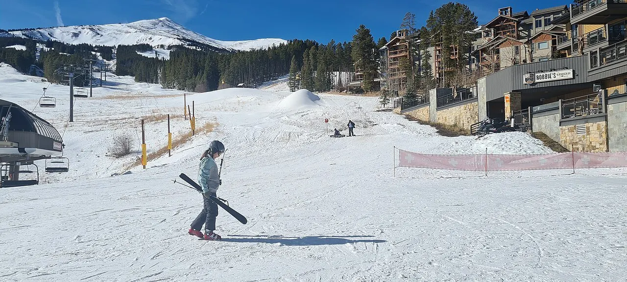 This image depicts Breckenridge ski resort at noon, near peaks eight and nine.