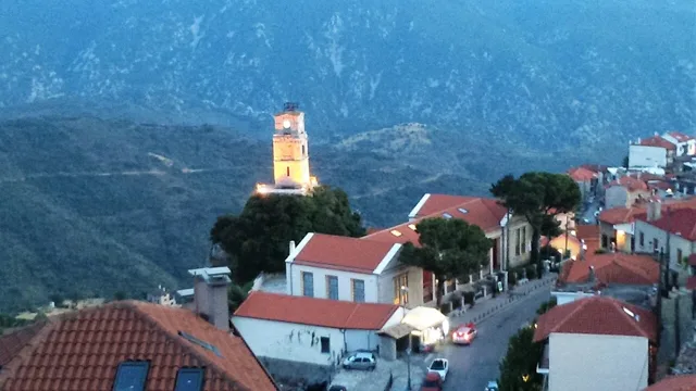 Rooftops and the clock tower in Arachova