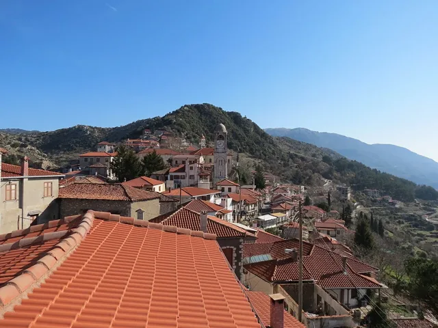 Dimitsana rooftops and the surrounding mountain landscape