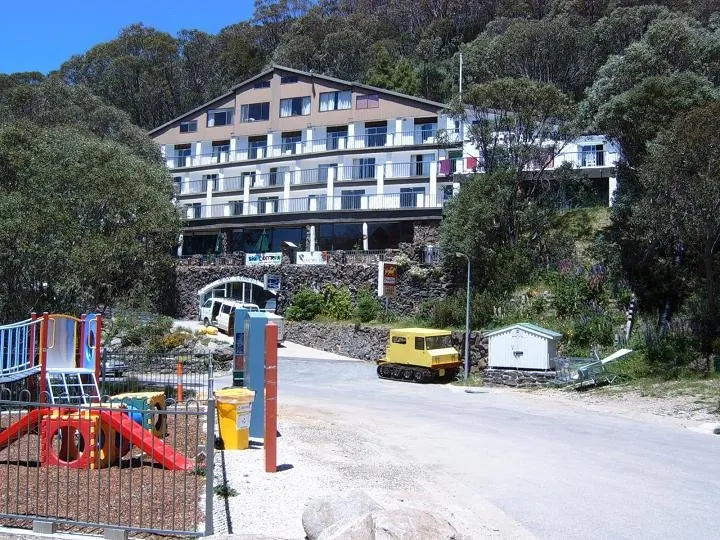 Falls Creek Hotel in summer (January). This is only 50m from the main ski bowl.
Note snowcat and snow trailers beside the road.

I took this picture in January 2006. Peter Ellis 22:21, 4 January 2006 (UTC)