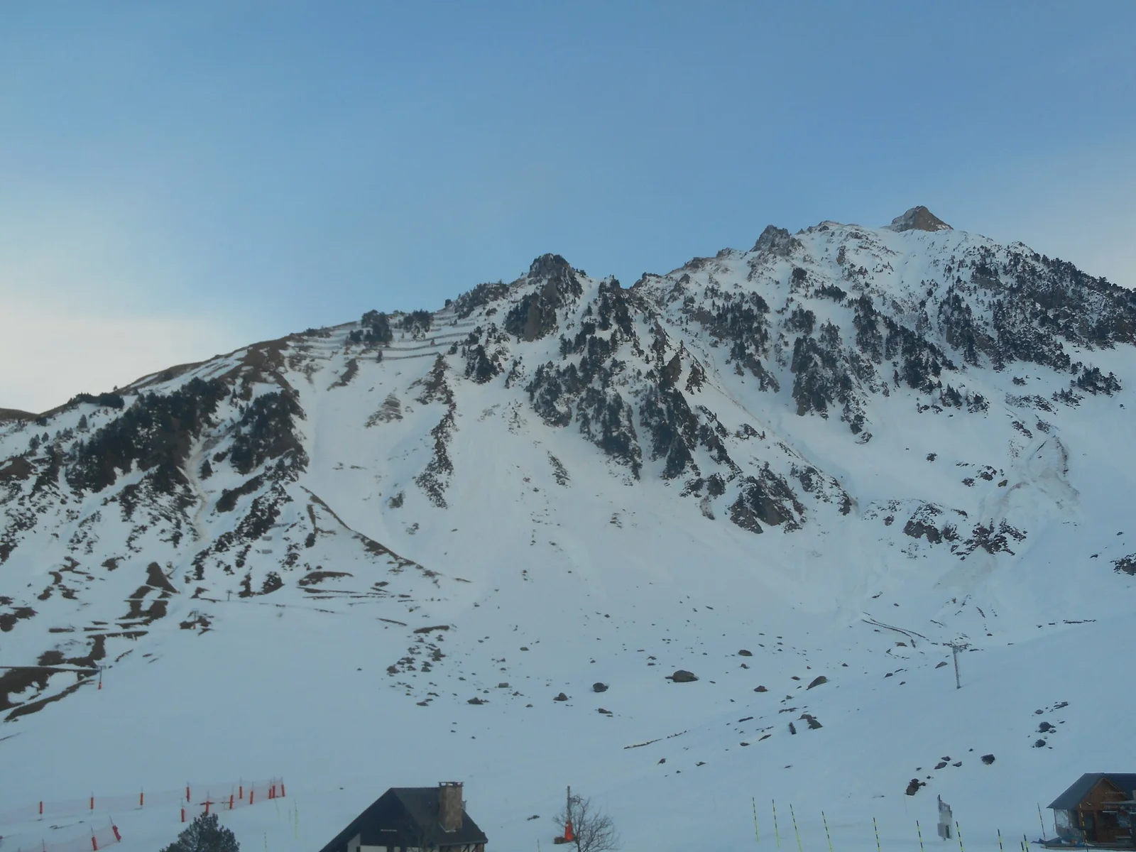 Snow-covered peaks and slopes above La Mongie.