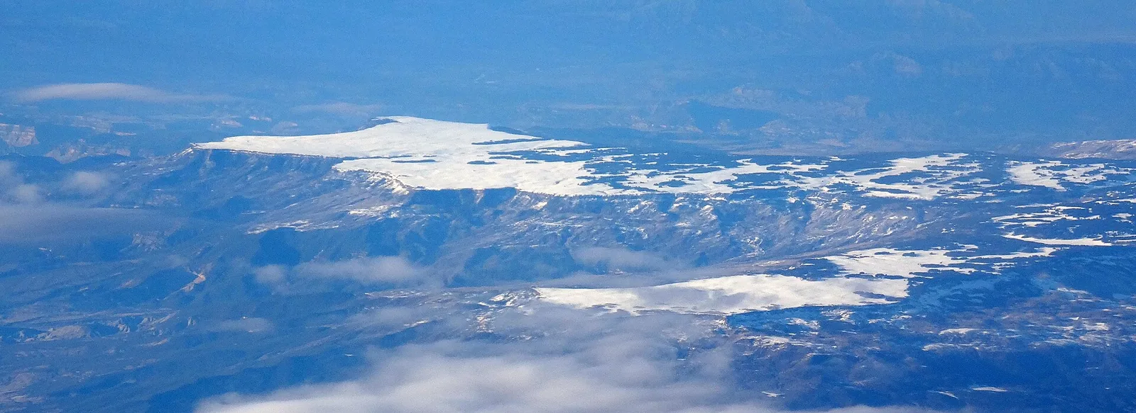 Aerial view of snow-covered Grand Mesa in western Colorado.