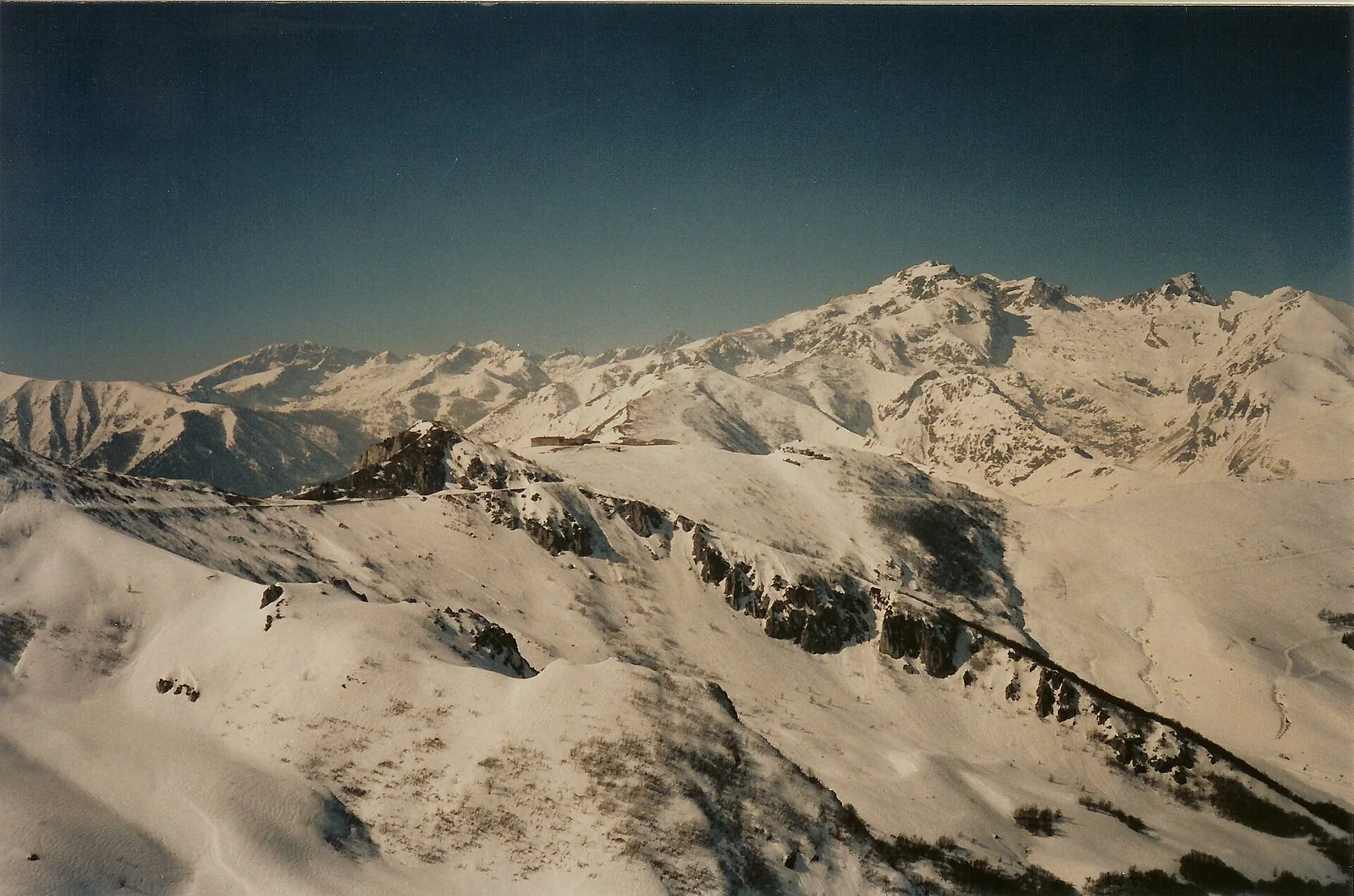 Snowy peaks including Roche de l’Abysse seen from the Limone ski area.