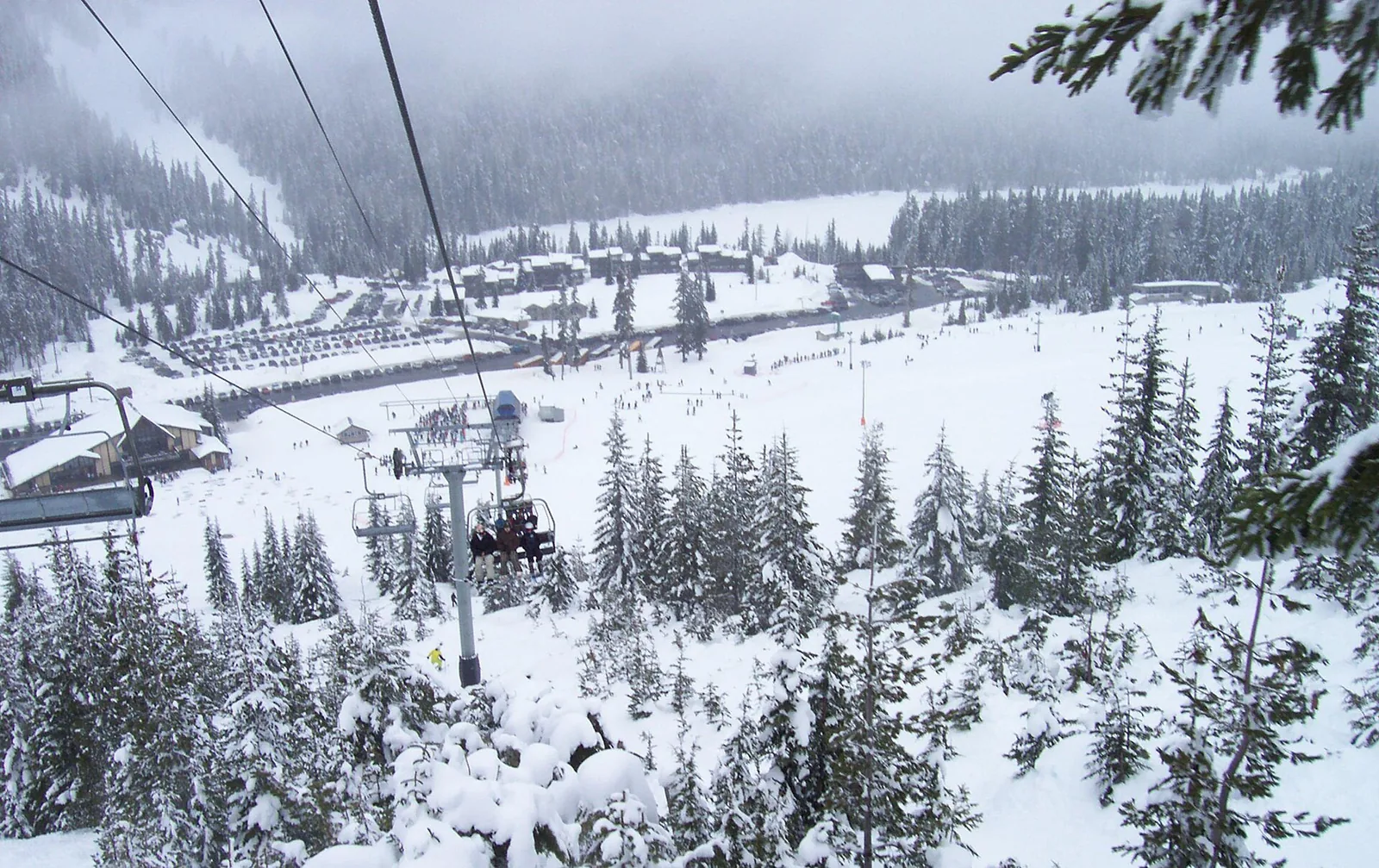 Chairlifts, trees and snowy runs at White Pass Ski Area, Washington.